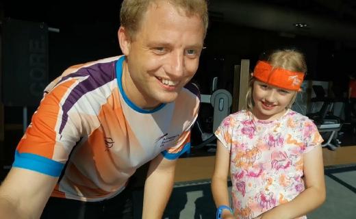 Hanna and Geoffrey making a video of the Plank Challenge.