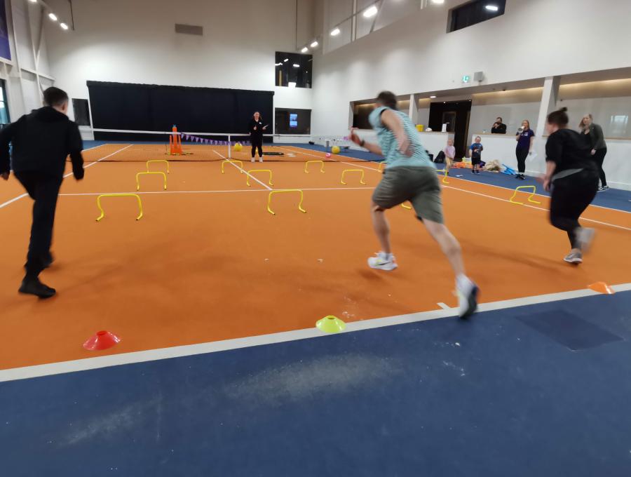 A photo of Geoffrey sprinting